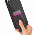 hand removing Backbone from Tread pink charging case